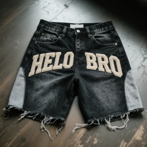 A8a90ad283cb24f94b7d69deb6daaaec01.webp Custom Manufacturer Man Streetwear Y2k Vintage Flare Distressed Jeans Shorts Distressed Embroidery Rhinestone Denim Jorts Men